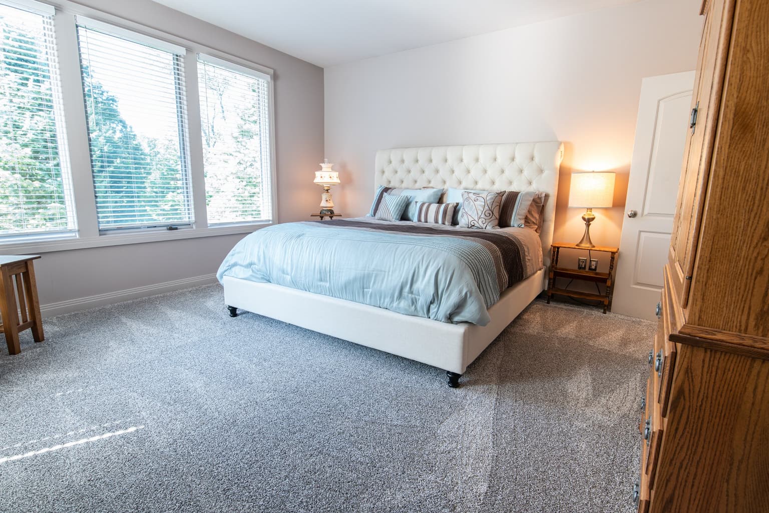 Bright bedroom with freshly cleaned, fast-drying carpet
